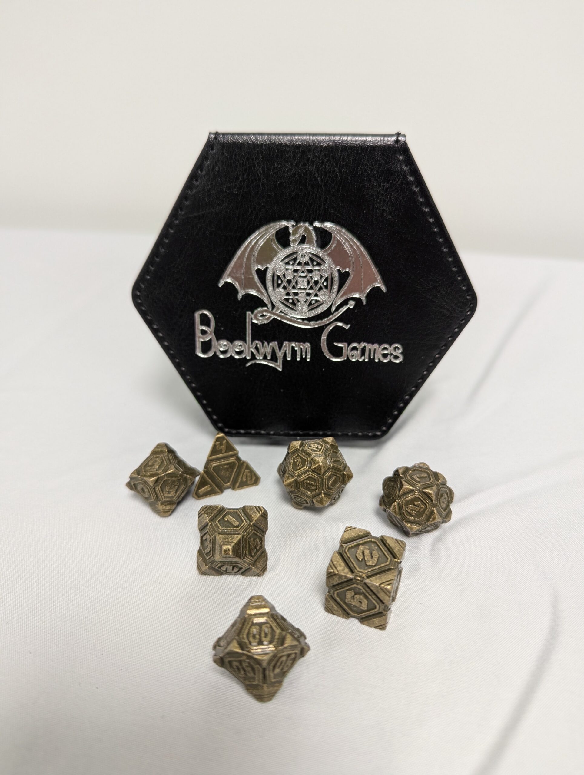 043 - Bronze Metal 7 piece dice set with black leather case
