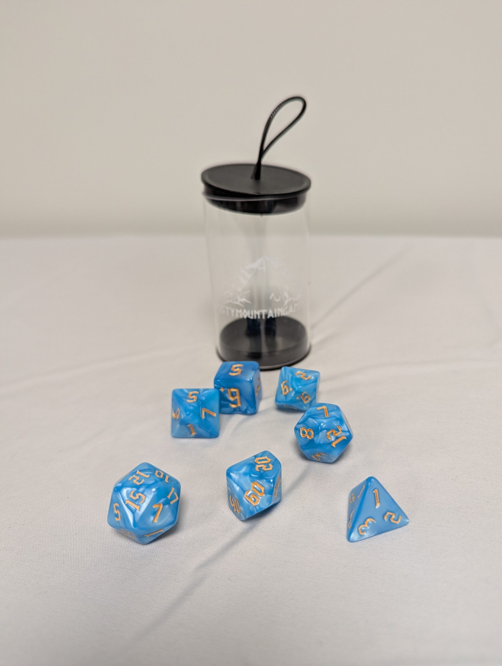 047 - Blue Acrylic 7 piece dice set