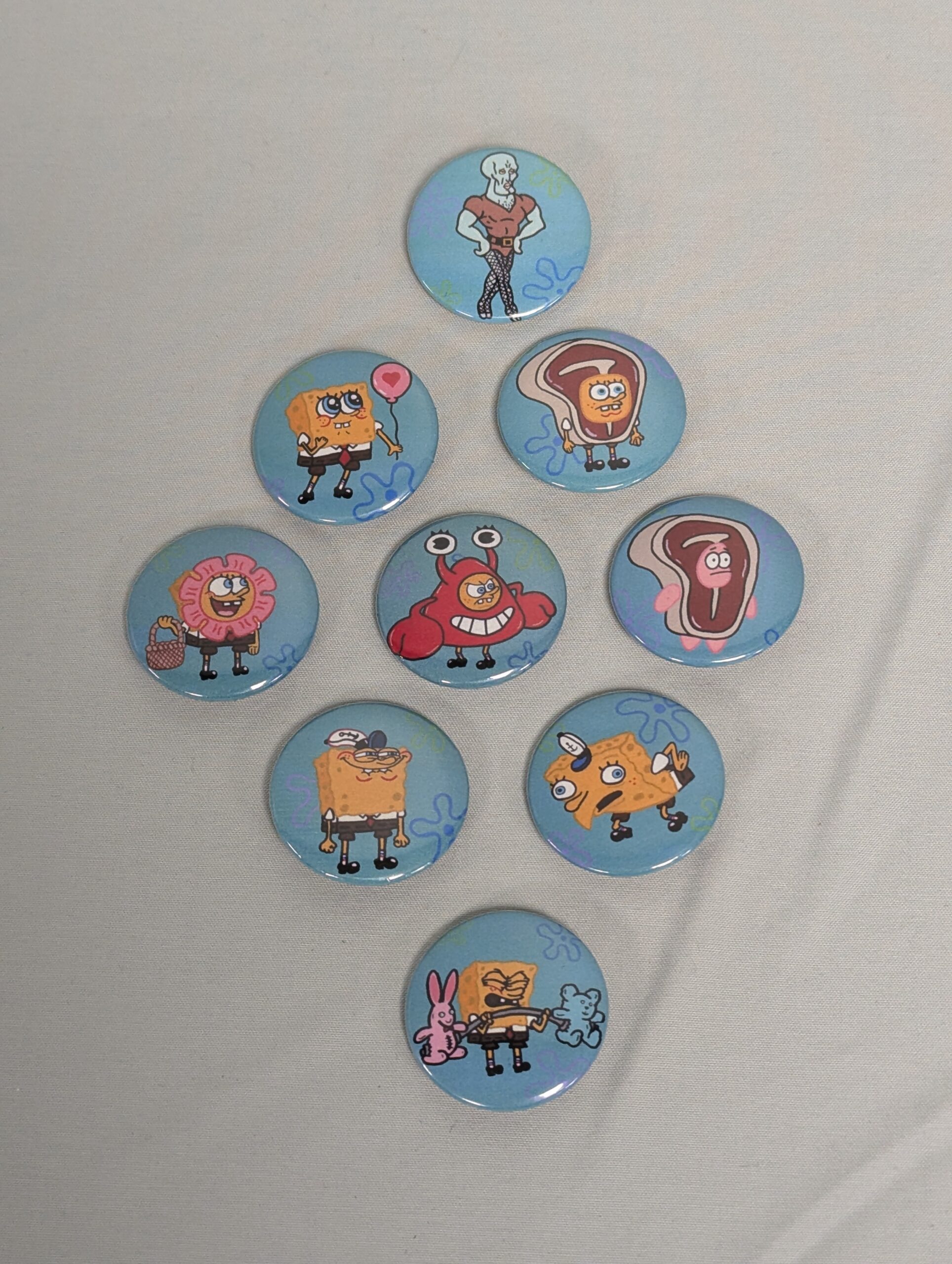 057 - 9 1.25" Spongebob Squarepants buttons