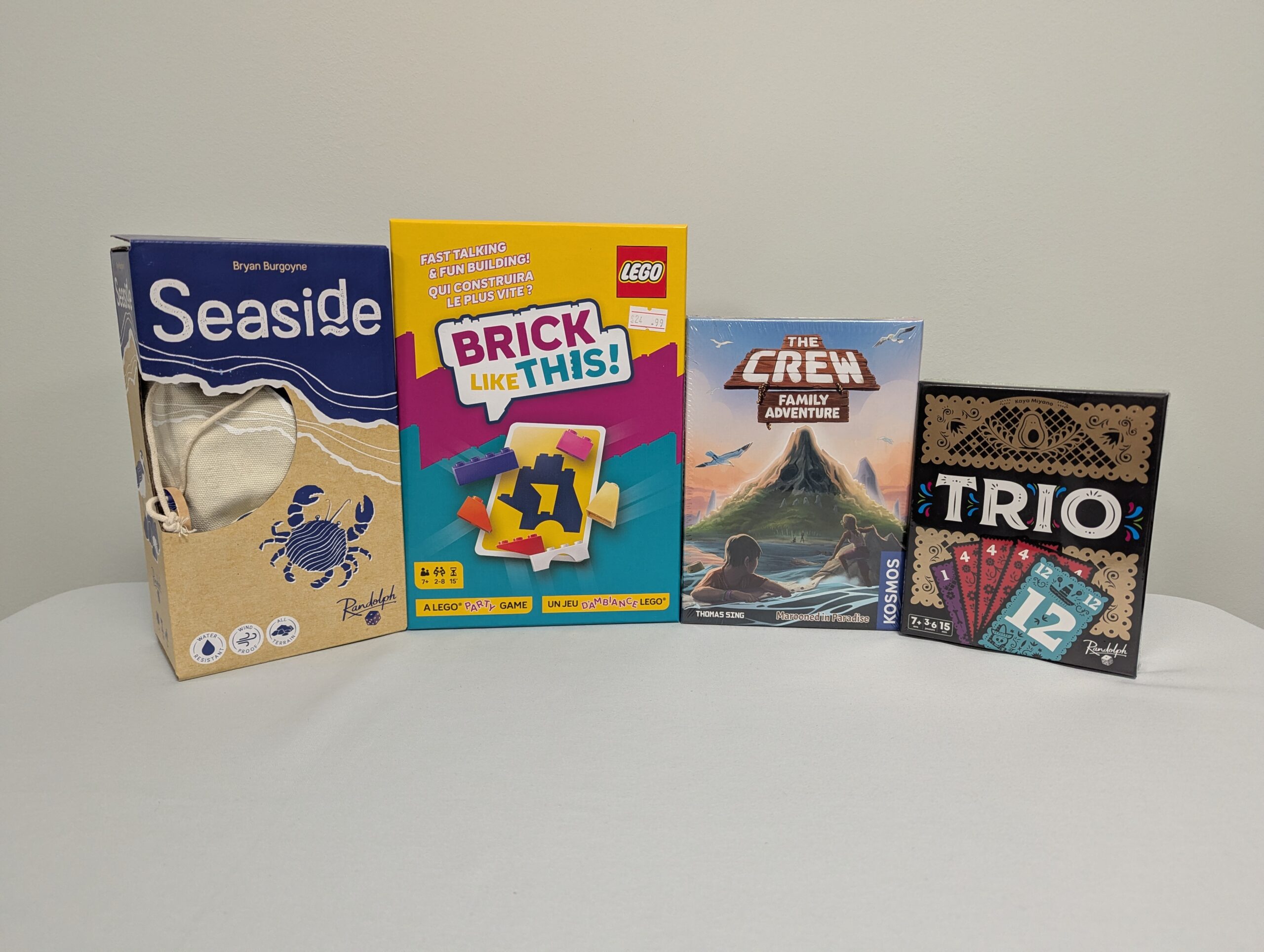 113 - Family Boardgame Bundle: Seaside, Lego Brick Like This, the Crew, & Trio